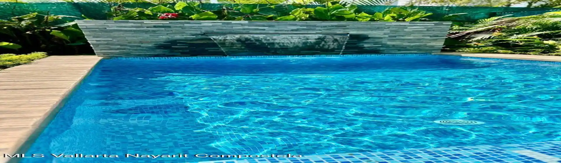 Pool with fountain in the garden area