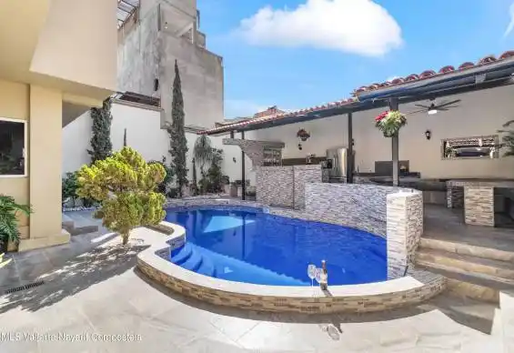 Private pool, dinning and kitchen area.