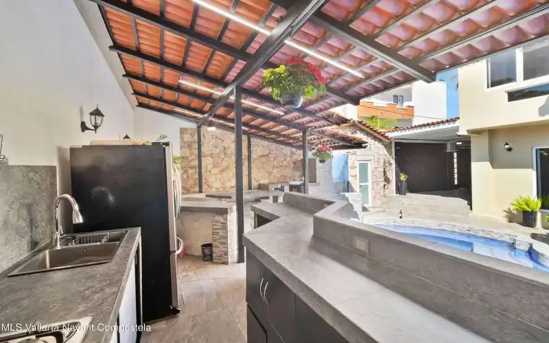 Kitchen view to common area and garage..