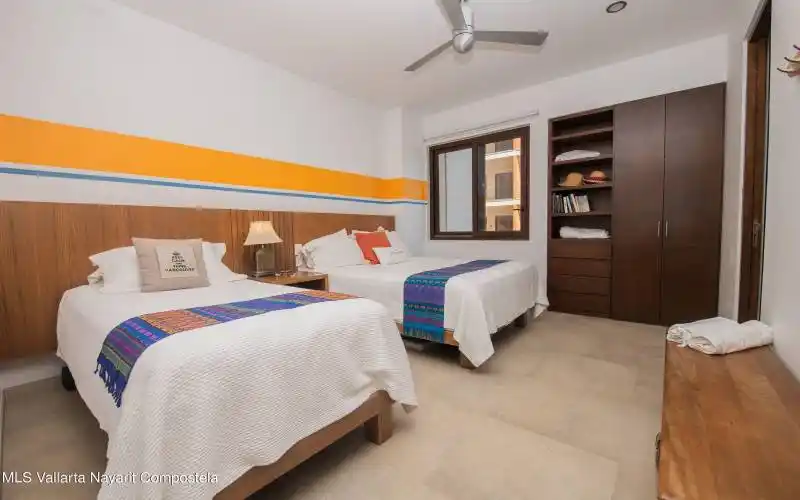 orange bedroom to closet