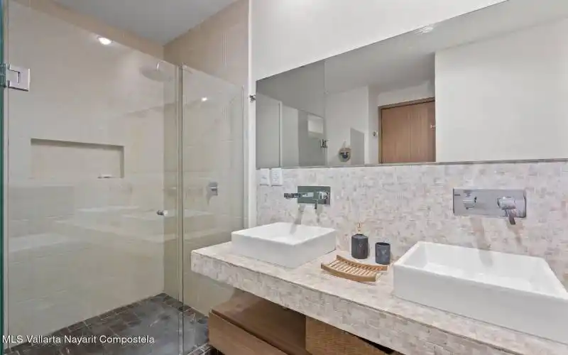 Shower & double sink bathroom
