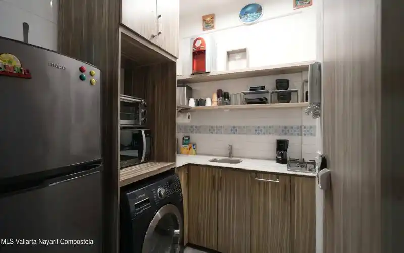 KITCHEN & LAUNDRY AREA